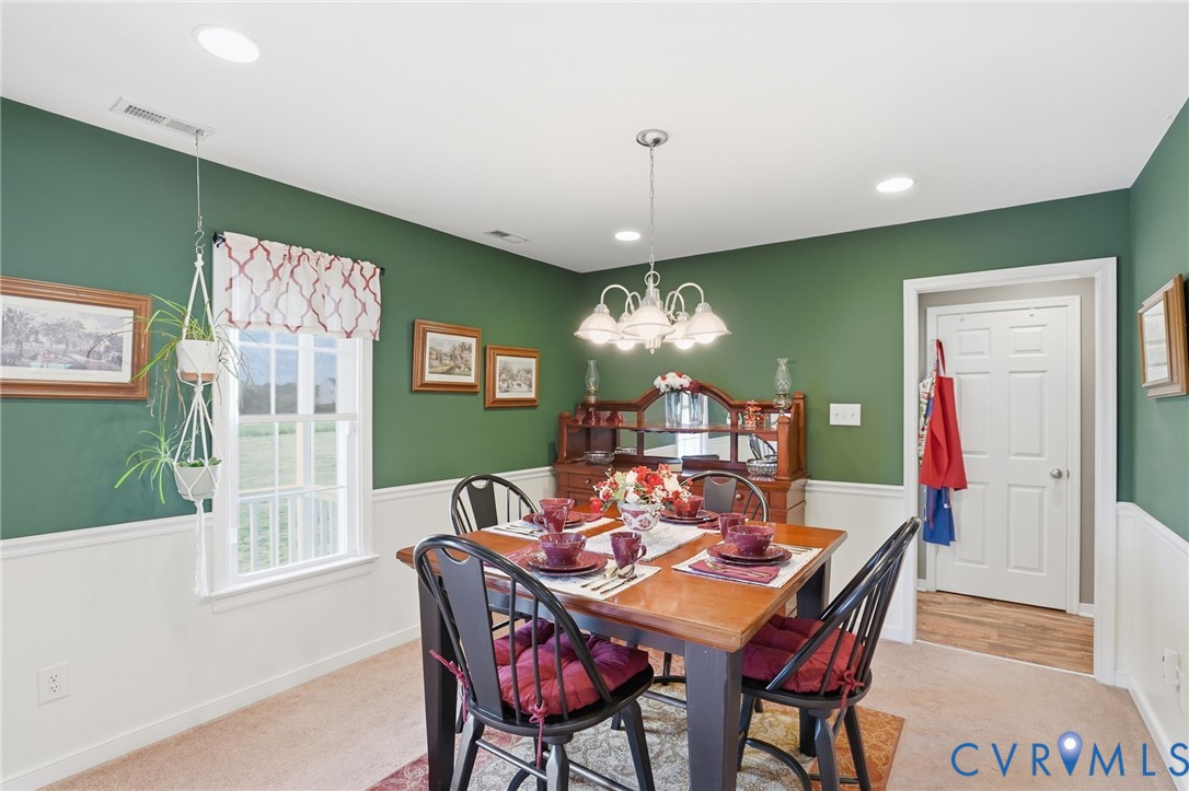 19012 Teman Road Beaverdam, VA 23015 - Photo 7 of 41 a view of a dining room with furniture window and wooden floor