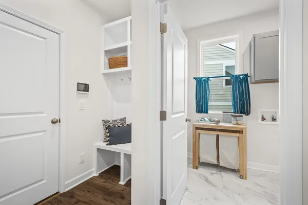 a en suite bathroom with a sink and a mirror