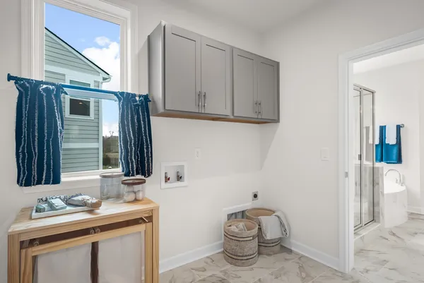a bathroom with a sink toilet and mirror
