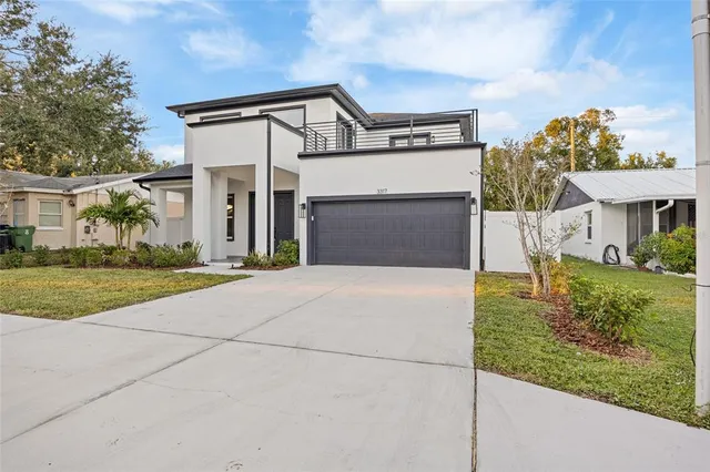 front view of a house with a yard