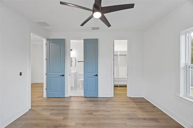 a close view of a sink and dishwasher with kitchen countertops