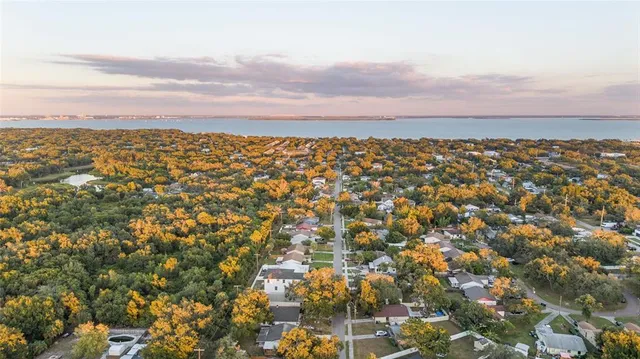 a picture of a kitchen with a refrigerator