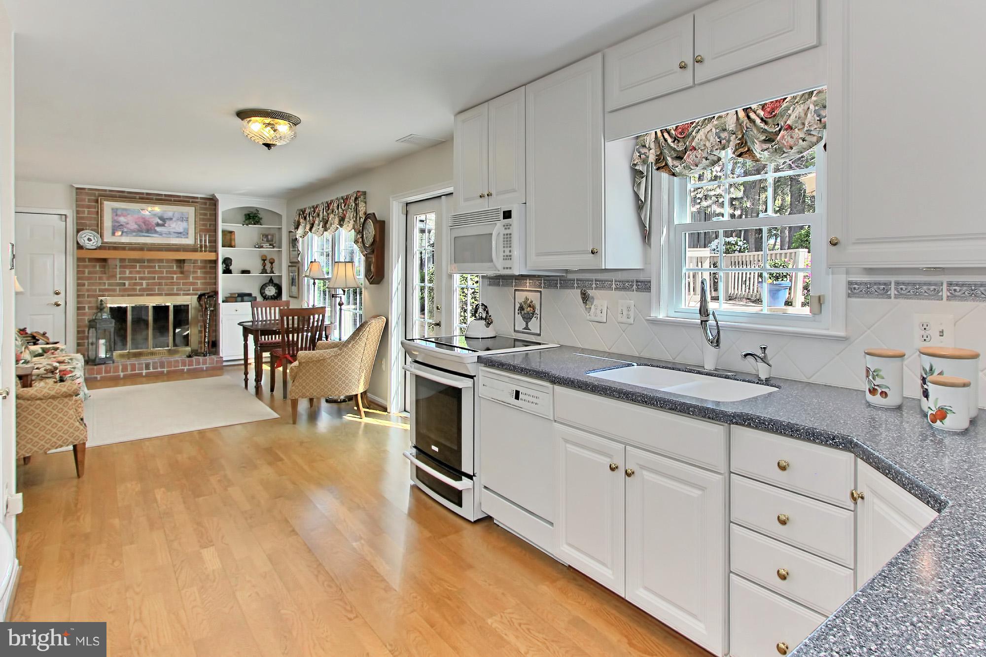 8305 Magic Leaf Road Springfield, VA 22153 - Photo 11 of 30 Bright and Spacious Kitchen Opens to Family Room