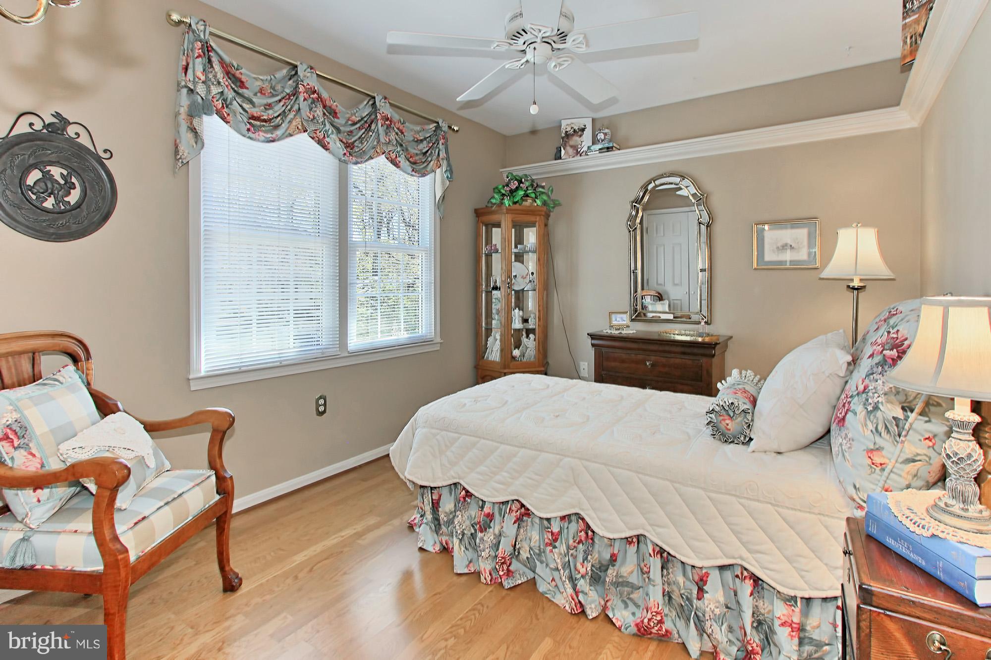 8305 Magic Leaf Road Springfield, VA 22153 - Photo 20 of 30 Bedroom 3 with Hardwood Floor and Backyard Views