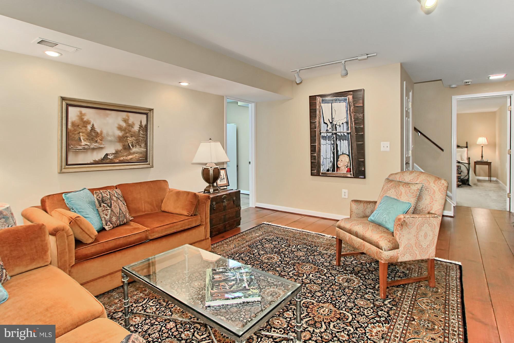 8305 Magic Leaf Road Springfield, VA 22153 - Photo 22 of 30 Recreation Room has Stunning Wide Plank Pine Floor