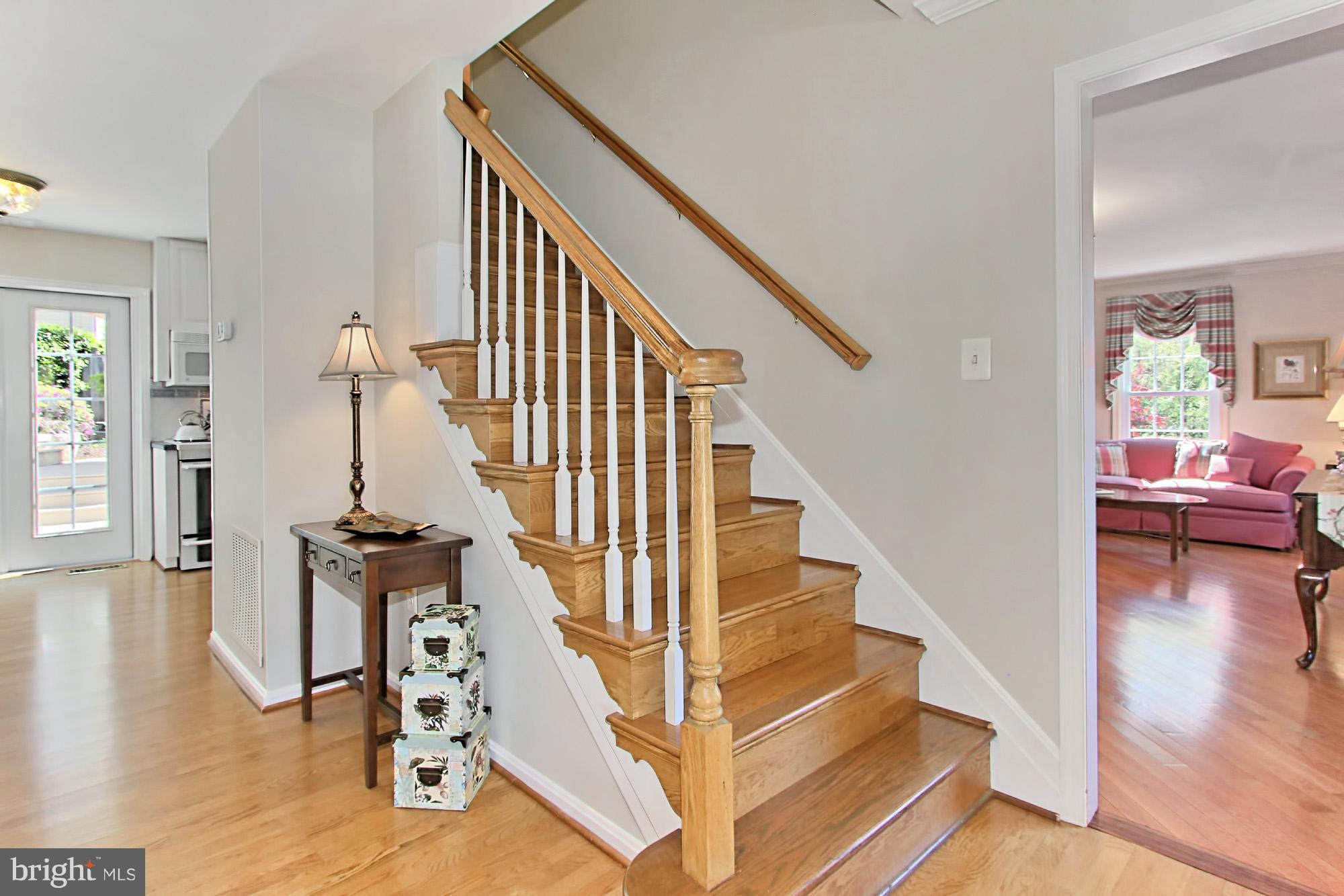 8305 Magic Leaf Road Springfield, VA 22153 - Photo 4 of 30 Wood Flooring on Main and Upper and Wood Stairs