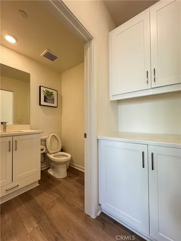 a view of a storage & utility room with a window