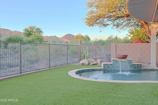 a view of a table and chairs in the patio