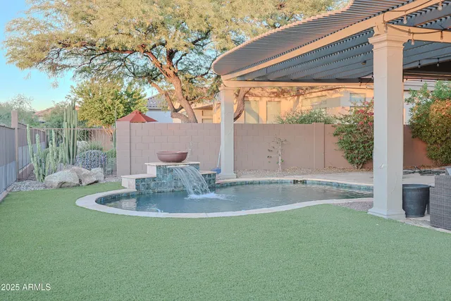 a view of a city with lush green forest