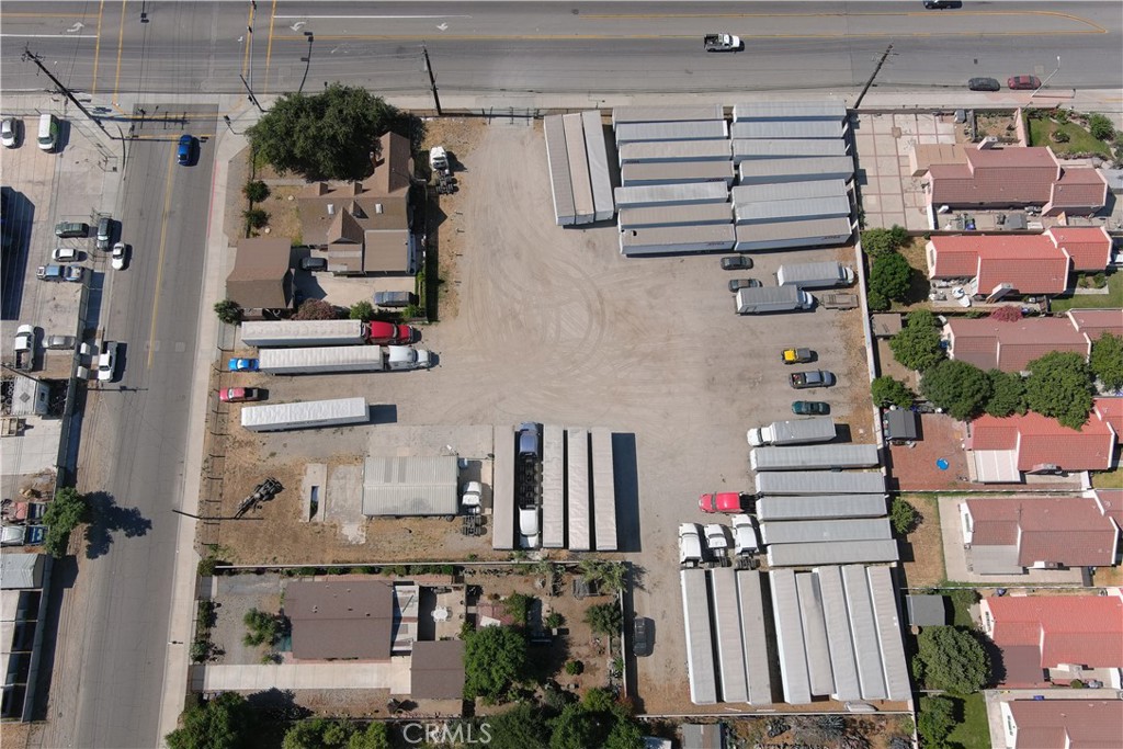 14690 Arrow Route Fontana, CA 92335 - Photo 6 of 9 an aerial view of a house with parking