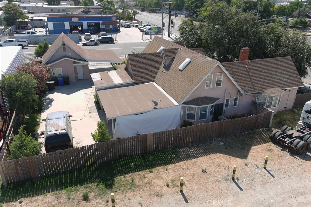 14690 Arrow Route Fontana, CA 92335 - Photo 9 of 9 an aerial view of a house with a yard