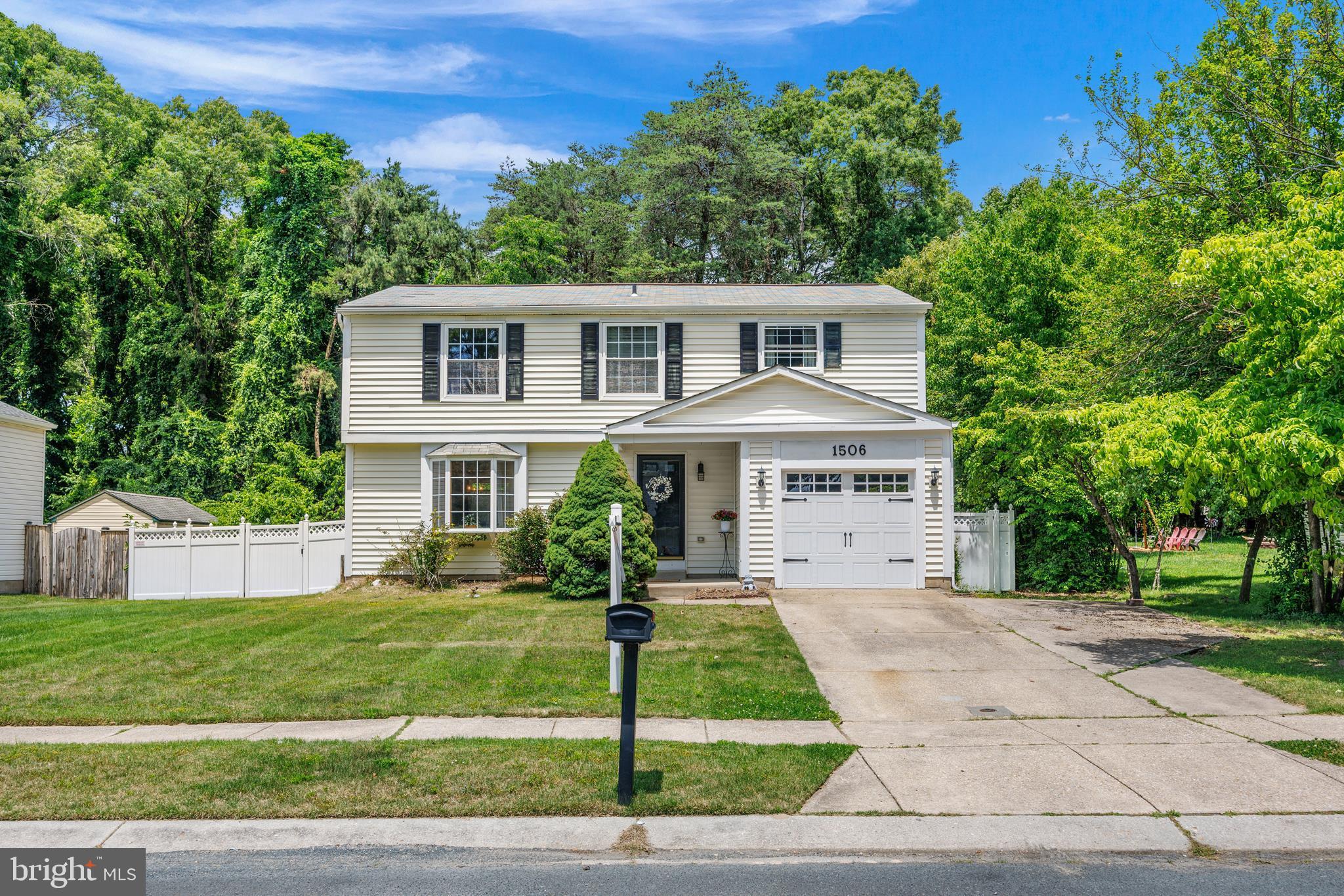 1506 Gollum Road Hanover, MD 21076 - Photo 3 of 44 a front view of a house with a garden