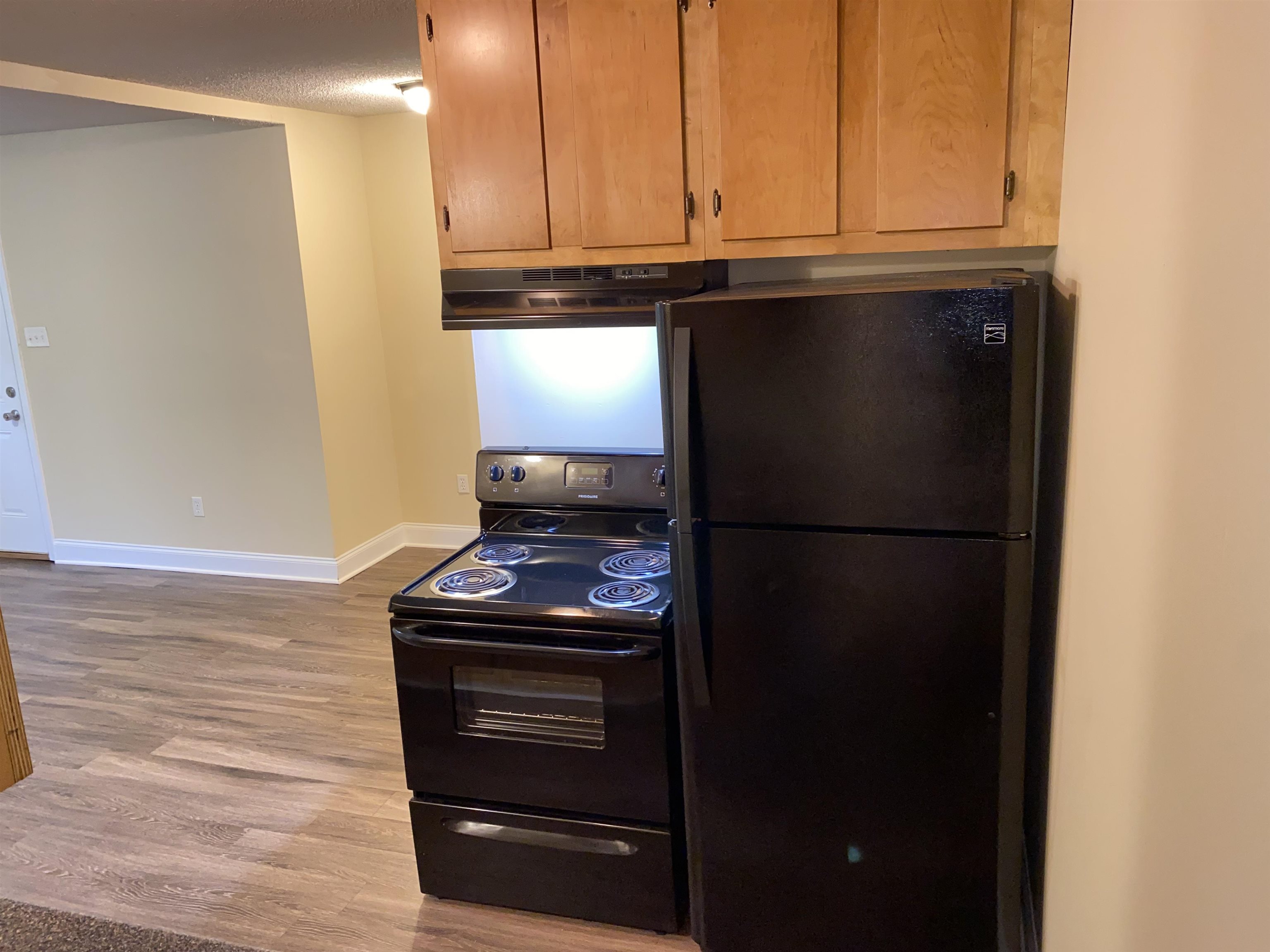 4106 Lawrence Road Memphis, TN 38122 - Photo 6 of 21 a kitchen with a refrigerator and a stove