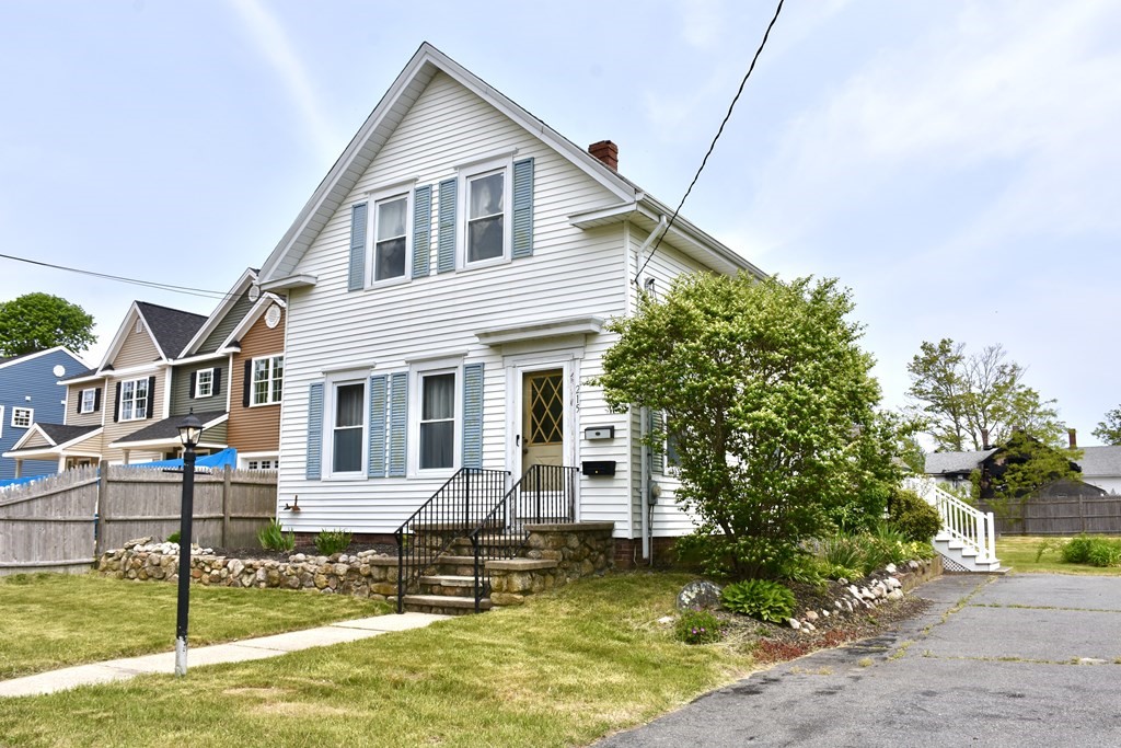 215 High Street Wareham, MA 02571 - Photo 1 of 19 a front view of a house with swimming pool
