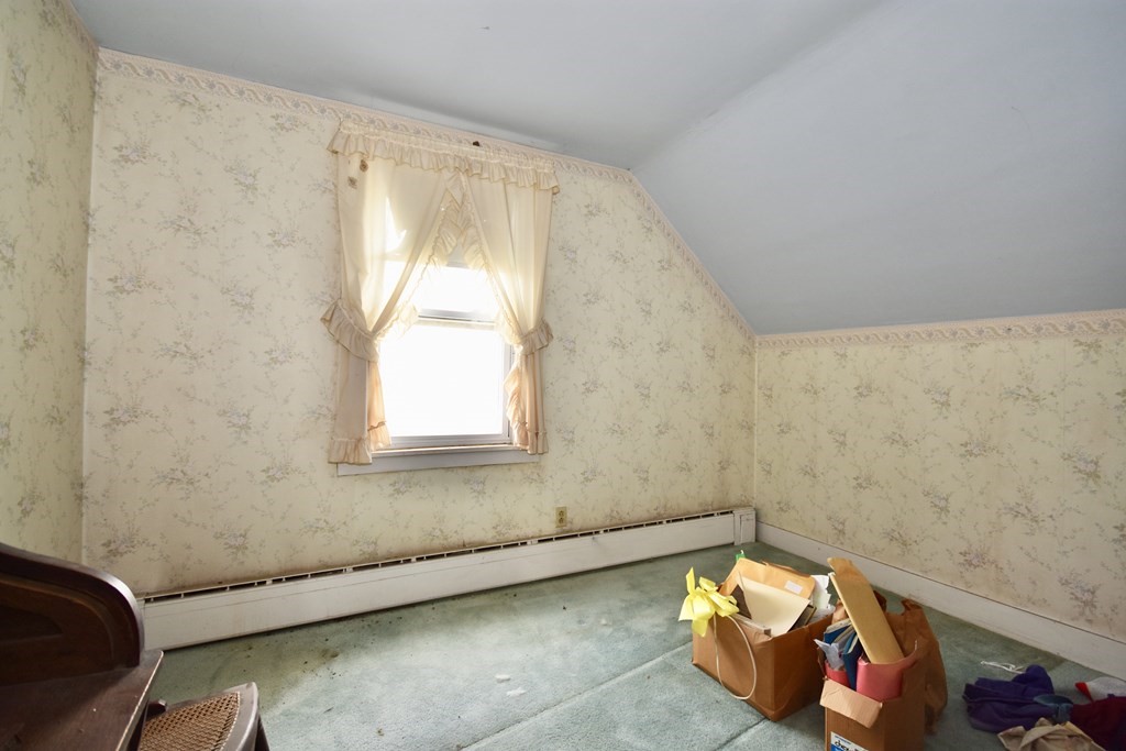 215 High Street Wareham, MA 02571 - Photo 18 of 19 a view of a room with rack and couch