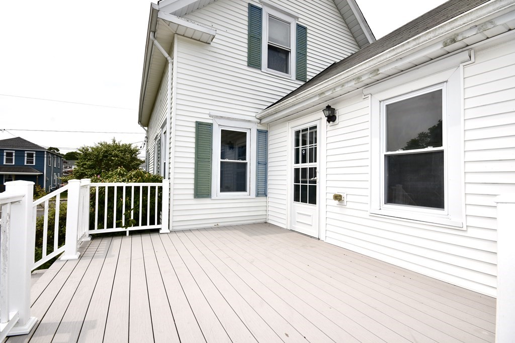 215 High Street Wareham, MA 02571 - Photo 6 of 19 a view of a wooden deck