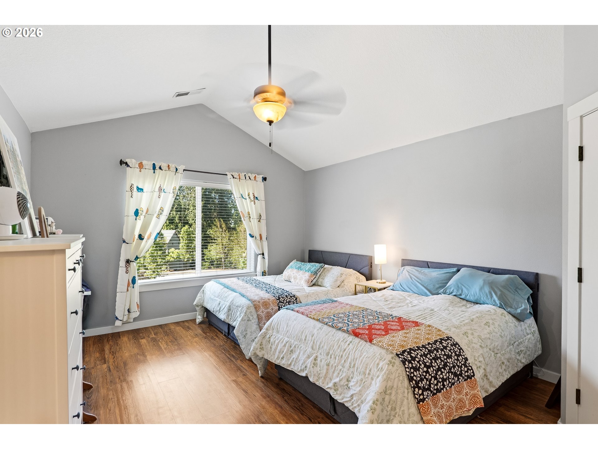 17376 Aubin Street Sandy, OR 97055 - Photo 16 of 21 a bedroom with a bed and a large window