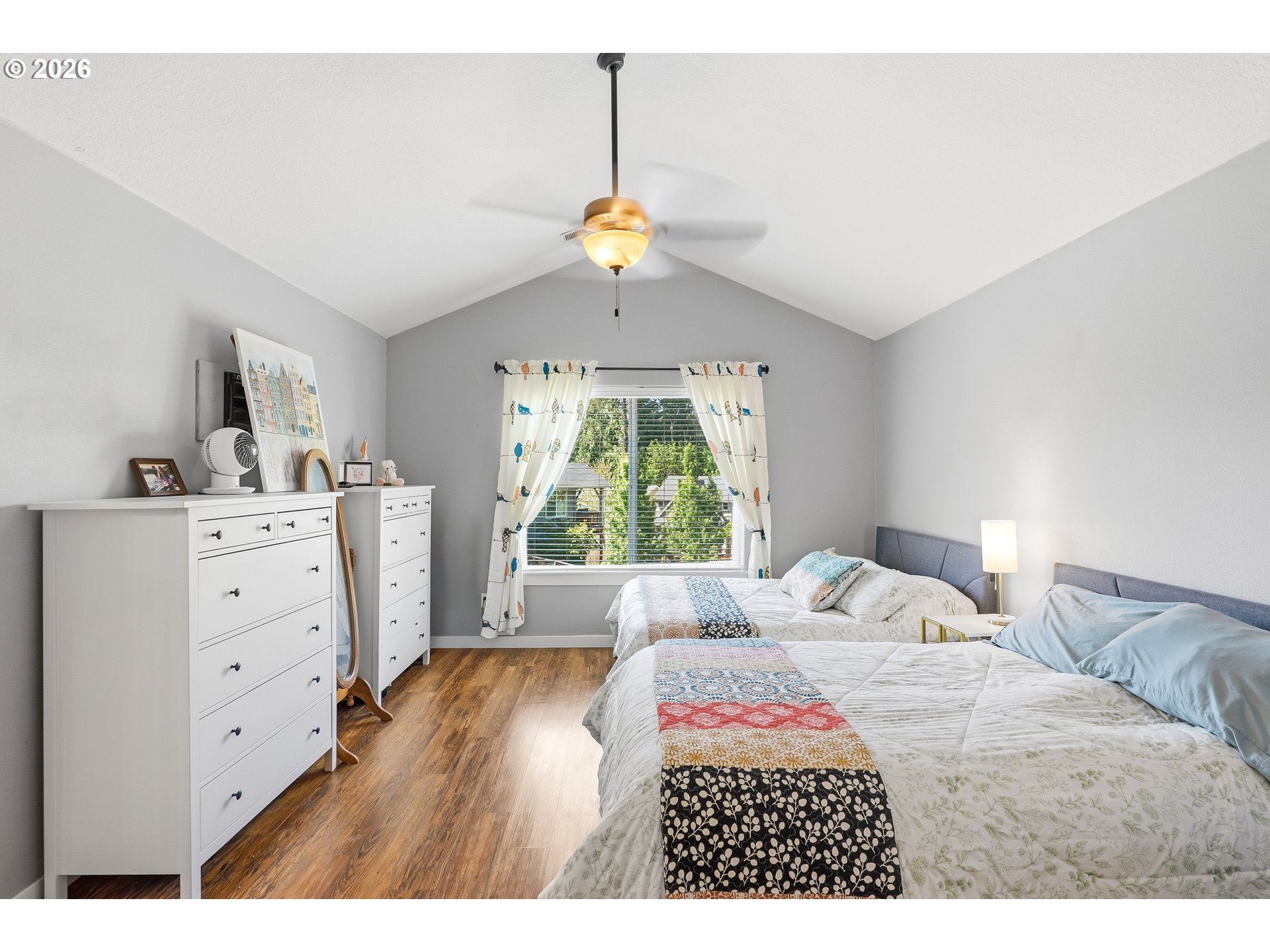 17376 Aubin Street Sandy, OR 97055 - Photo 17 of 21 a bedroom with a bed and a dresser