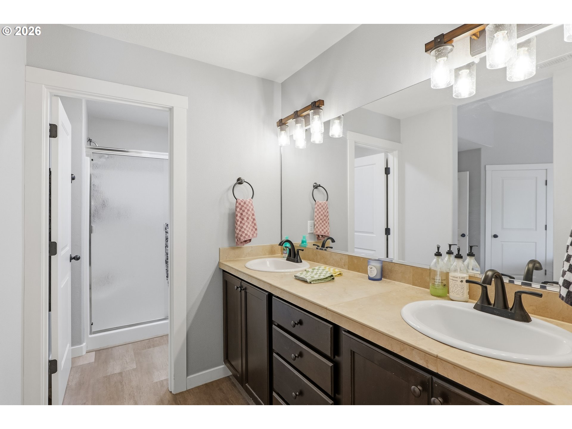 17376 Aubin Street Sandy, OR 97055 - Photo 18 of 21 a bathroom with a sink vanity granite shower and a mirror
