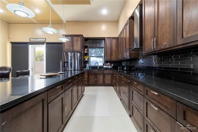 a large kitchen with cabinets