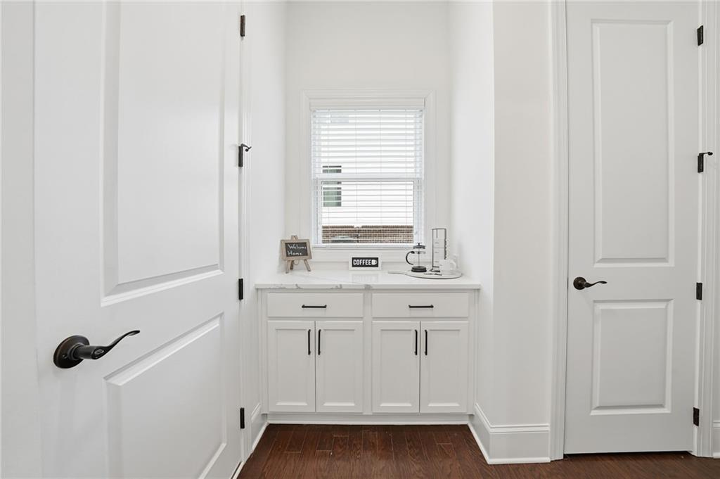 3180 Andover Street Cumming, GA 30028 - Photo 15 of 41 a bathroom with a sink and a window