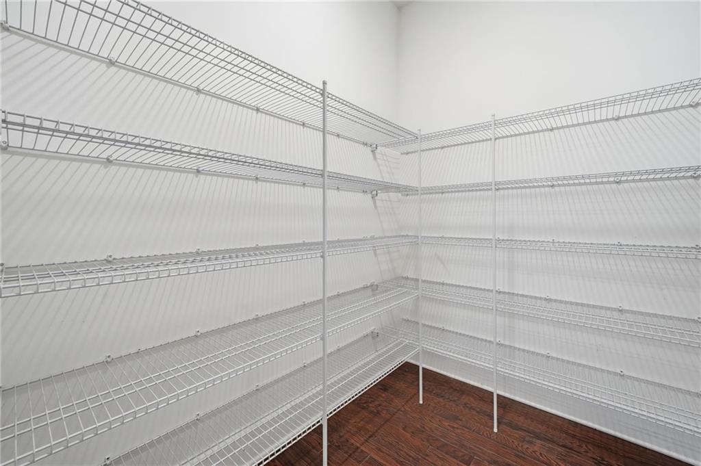 3180 Andover Street Cumming, GA 30028 - Photo 16 of 41 a view of a room with racks on the wall