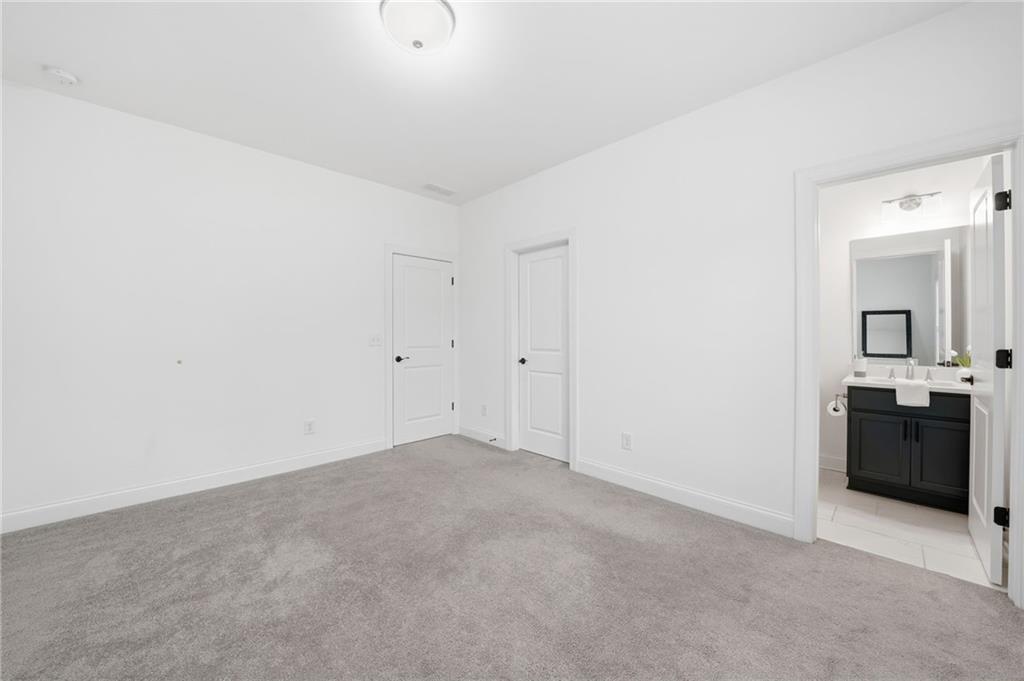3180 Andover Street Cumming, GA 30028 - Photo 20 of 41 a view of a big room with closet