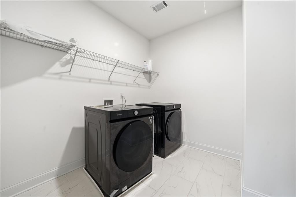 3180 Andover Street Cumming, GA 30028 - Photo 29 of 41 a utility room with dryer and washer