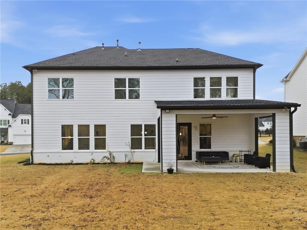 3180 Andover Street Cumming, GA 30028 - Photo 32 of 41 a front view of a house with yard