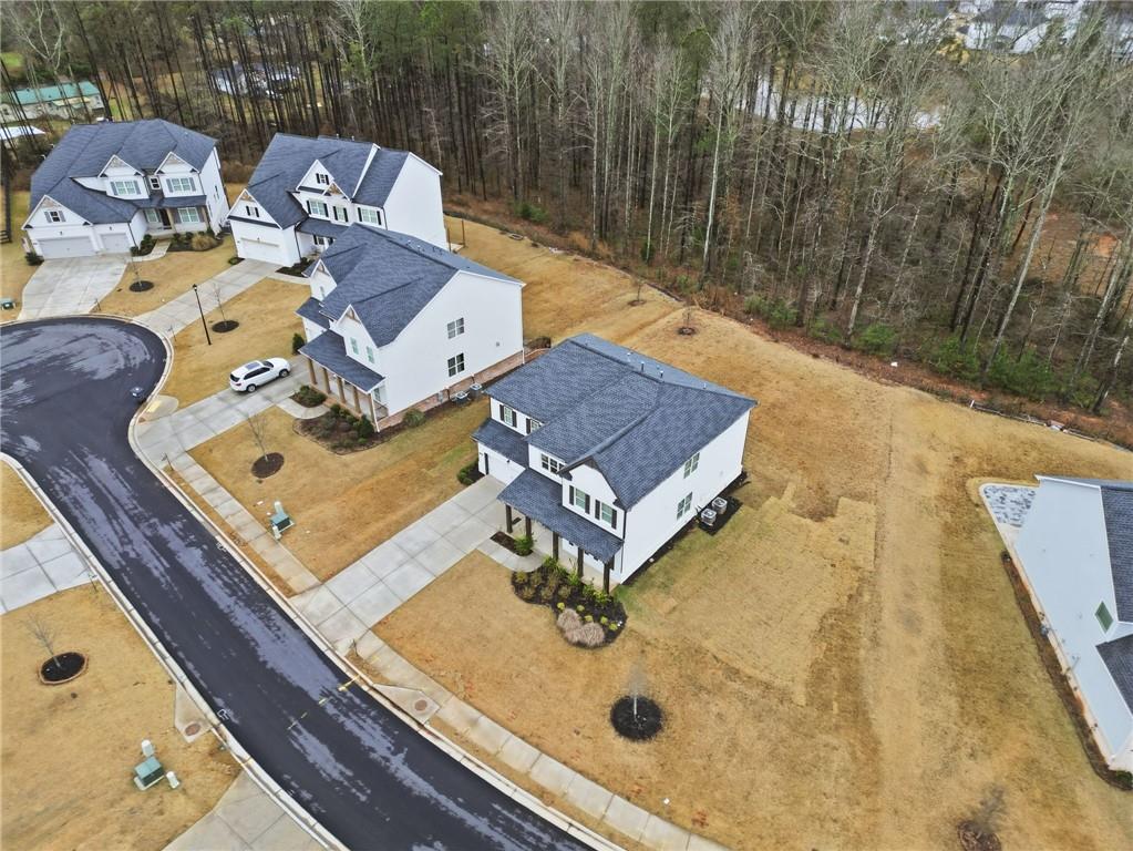 3180 Andover Street Cumming, GA 30028 - Photo 34 of 41 a view of a sink and table in the backyard