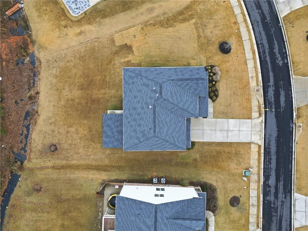 3180 Andover Street Cumming, GA 30028 - Photo 35 of 41 view of a bathroom with a tub and shower