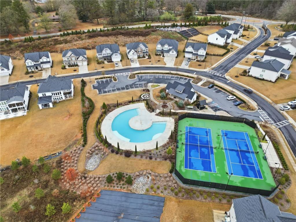 3180 Andover Street Cumming, GA 30028 - Photo 36 of 41 a picture of a table and chairs