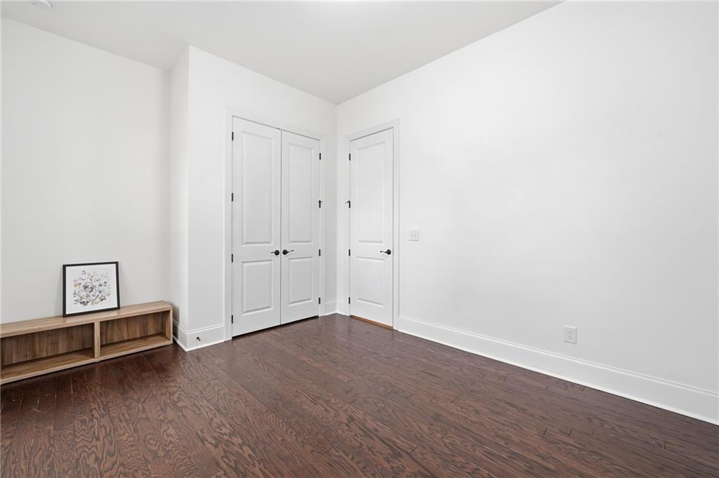 3180 Andover Street Cumming, GA 30028 - Photo 5 of 41 a view of an empty room with wooden floor