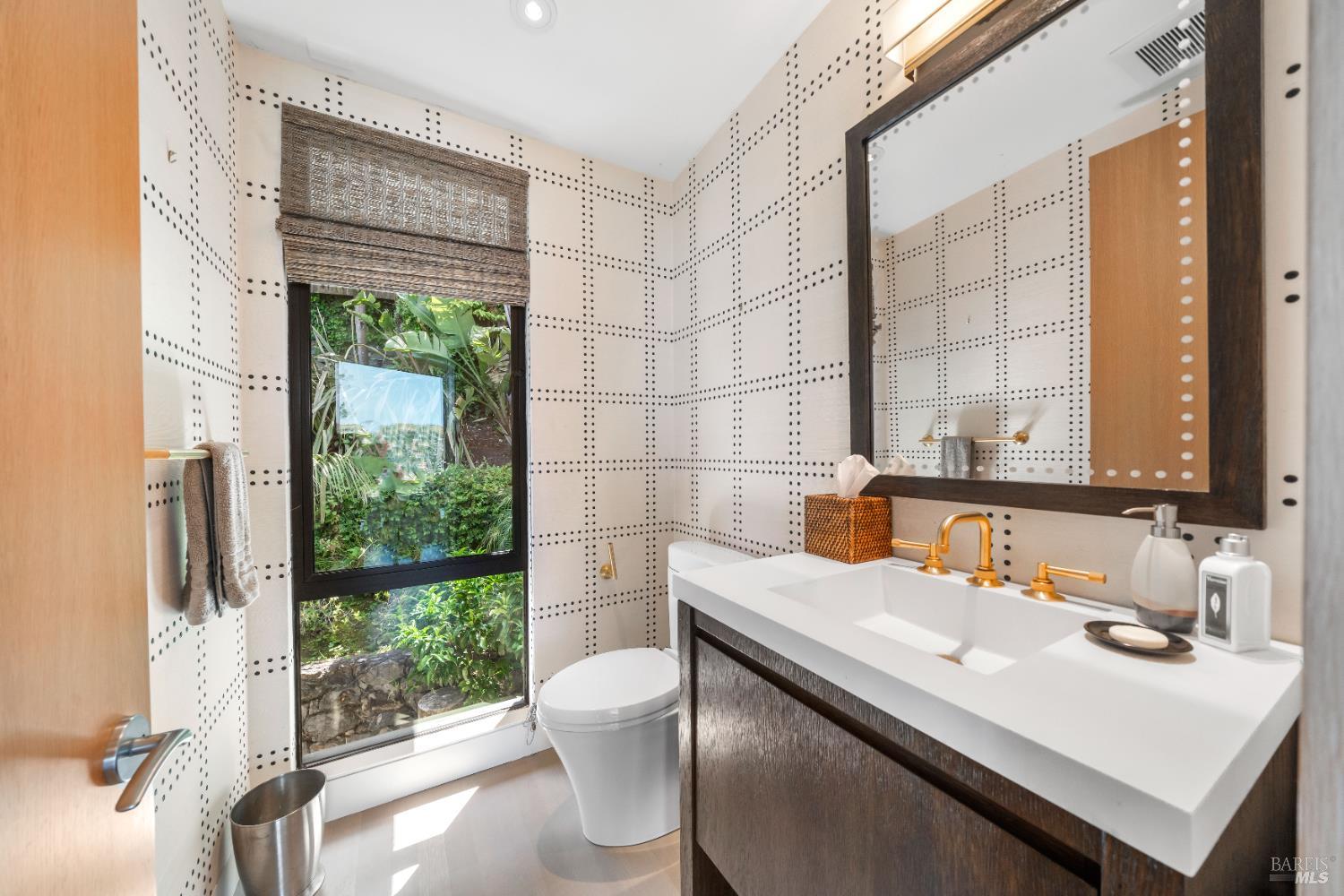 408 Golden Gate Avenue Belvedere, CA 94920 - Photo 16 of 71 a bathroom with a sink and a mirror
