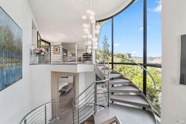 a view of a porch with furniture and front door