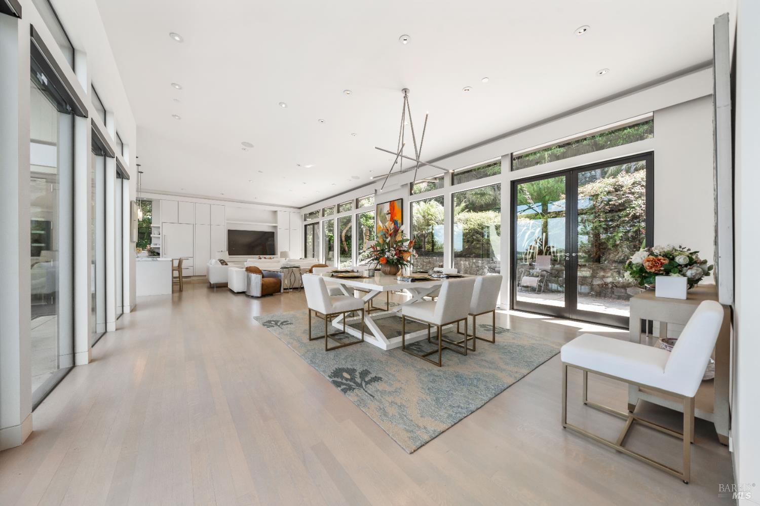 408 Golden Gate Avenue Belvedere, CA 94920 - Photo 22 of 71 a living room with furniture a table and chairs