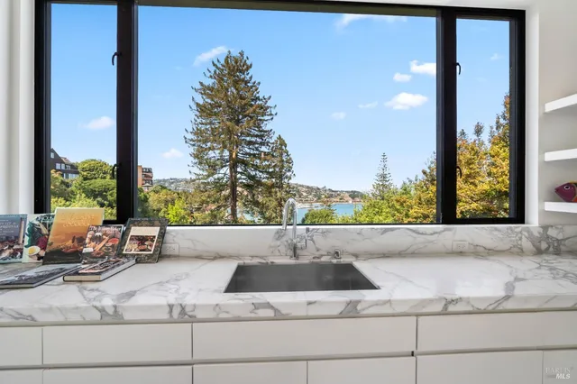 a view of backyard with patio