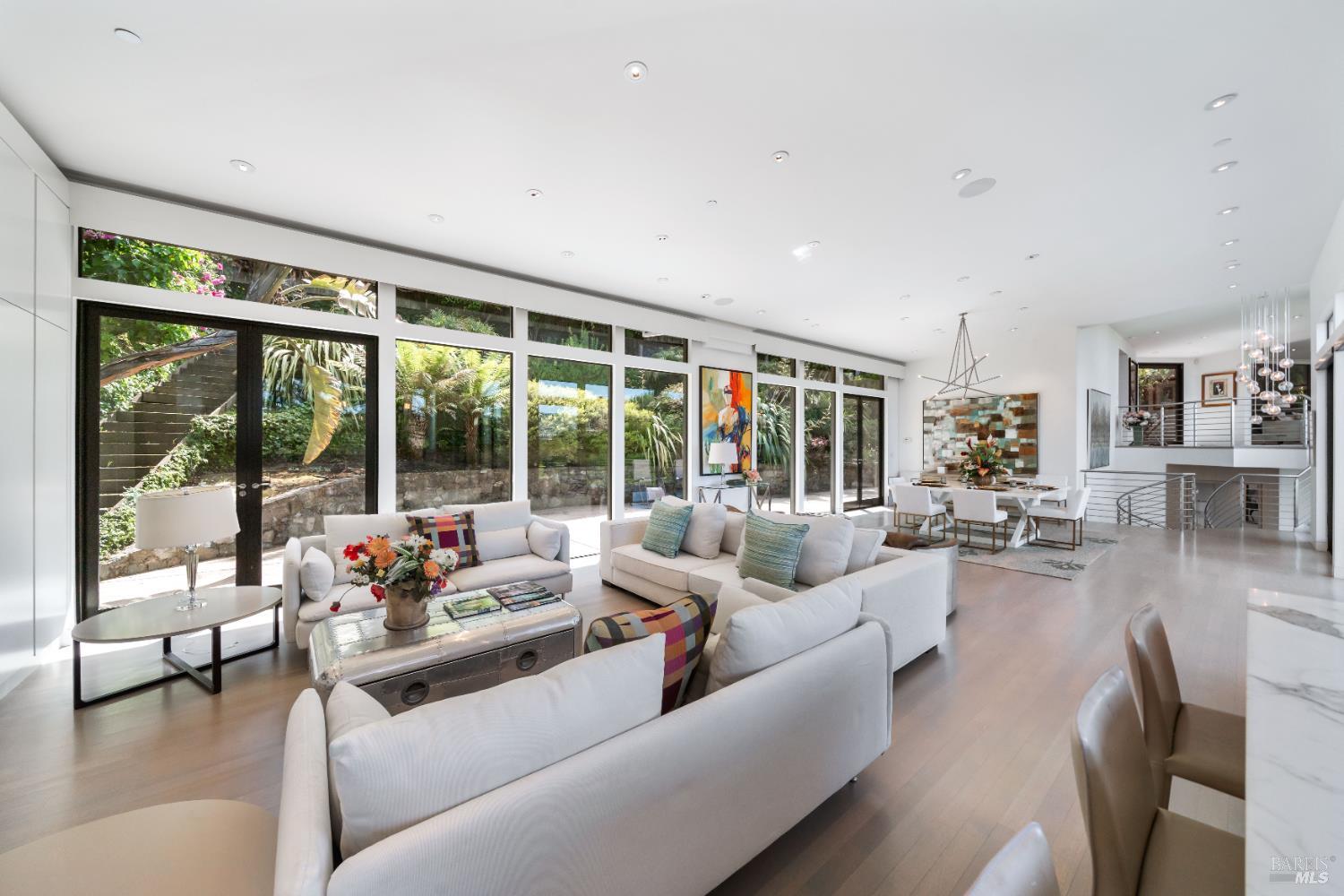 408 Golden Gate Avenue Belvedere, CA 94920 - Photo 35 of 71 a living room with furniture and a large window