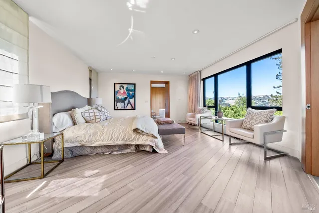 a bathroom with a glass shower door