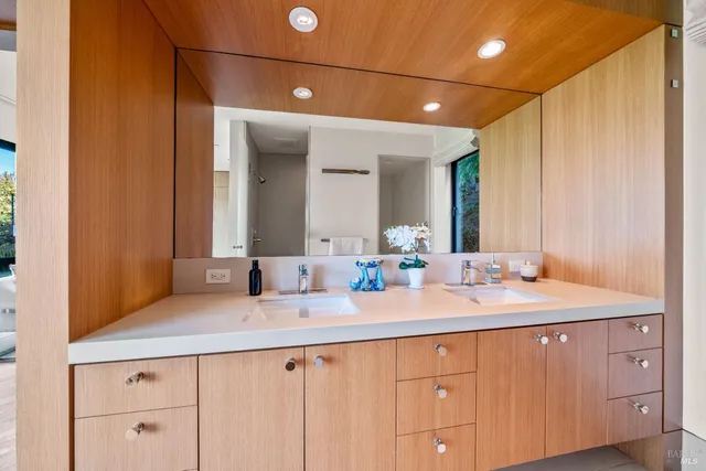 a view of swimming pool with outdoor seating and plants