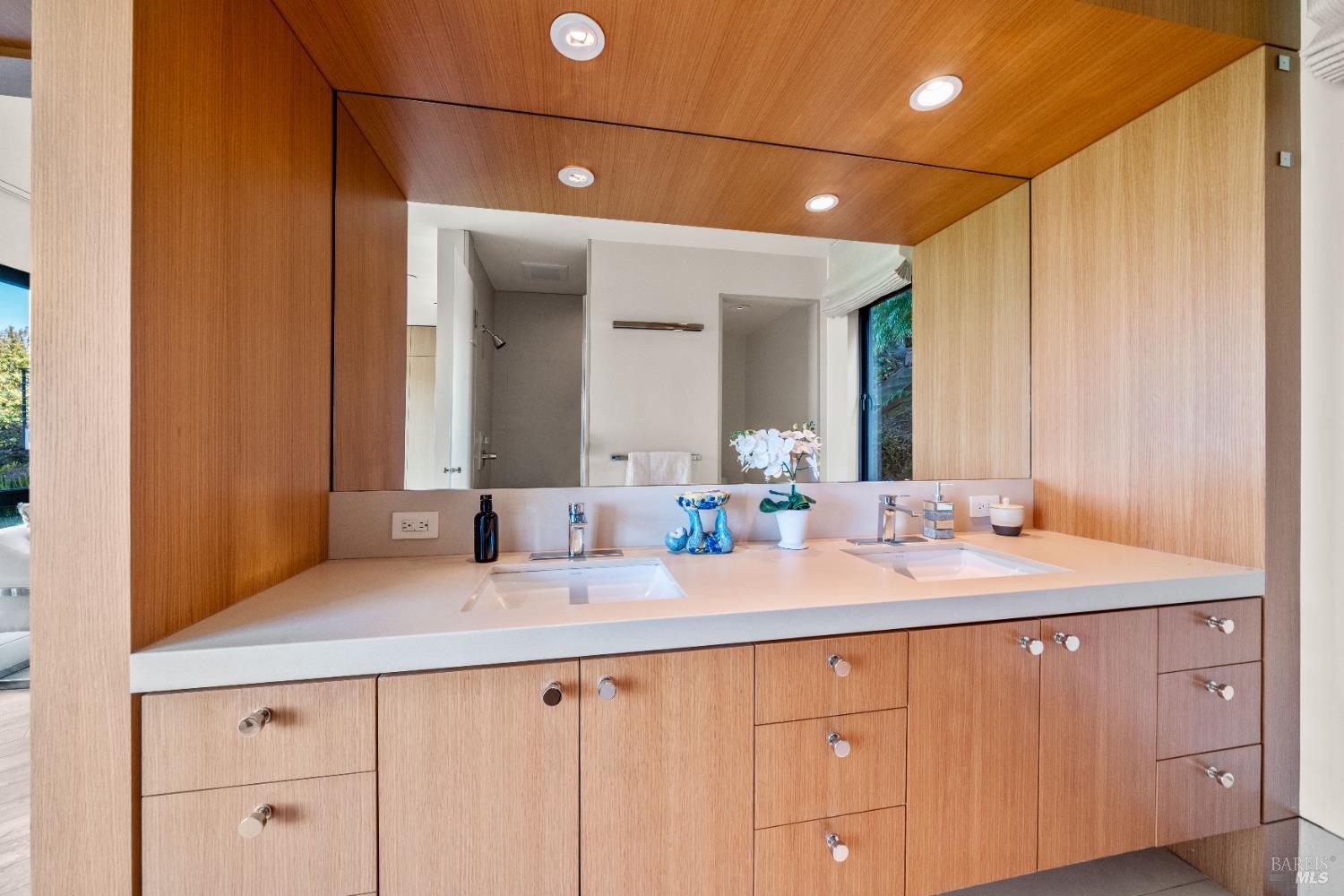 408 Golden Gate Avenue Belvedere, CA 94920 - Photo 48 of 71 a bathroom with a sink and a mirror