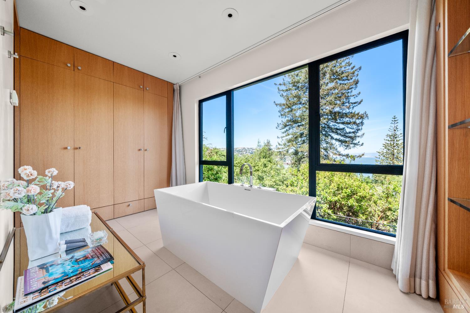 408 Golden Gate Avenue Belvedere, CA 94920 - Photo 49 of 71 a living room with furniture and a large window