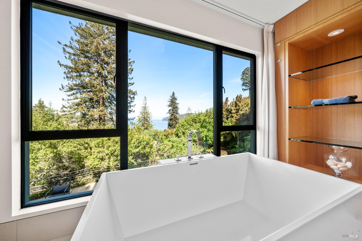 408 Golden Gate Avenue Belvedere, CA 94920 - Photo 50 of 71 a bed sitting in front of a large window