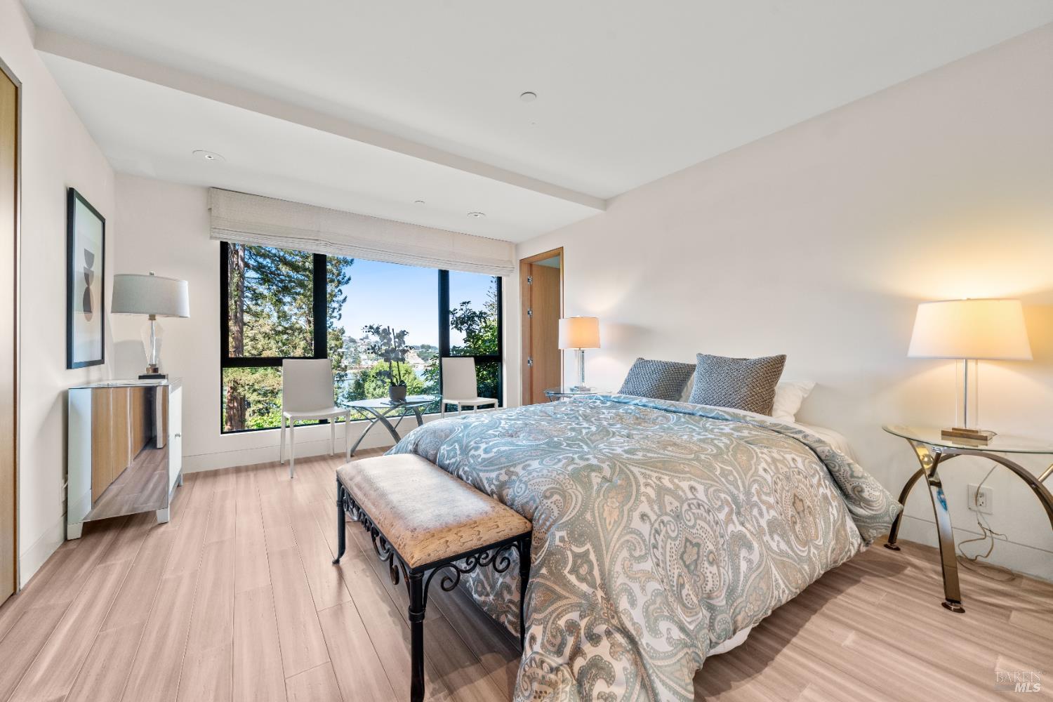 408 Golden Gate Avenue Belvedere, CA 94920 - Photo 53 of 71 a living room with a bed furniture and a large window