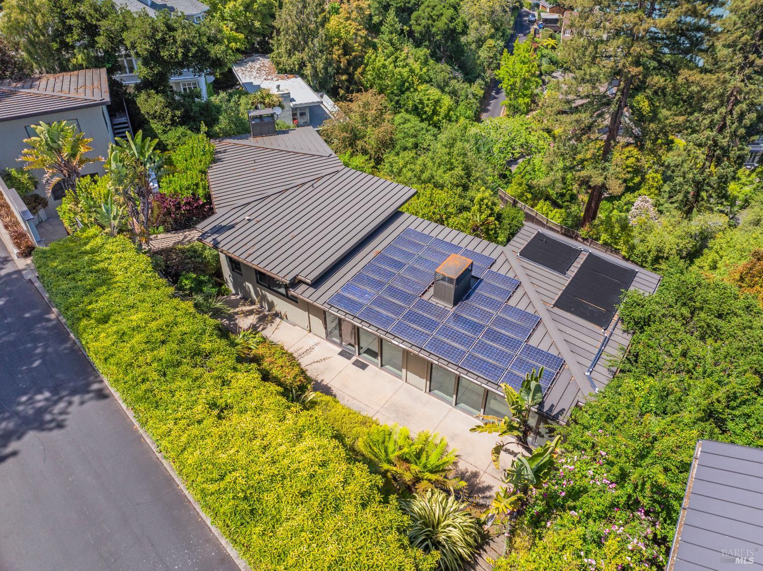 408 Golden Gate Avenue Belvedere, CA 94920 - Photo 71 of 71 a view of a patio with a table and chairs next to a yard