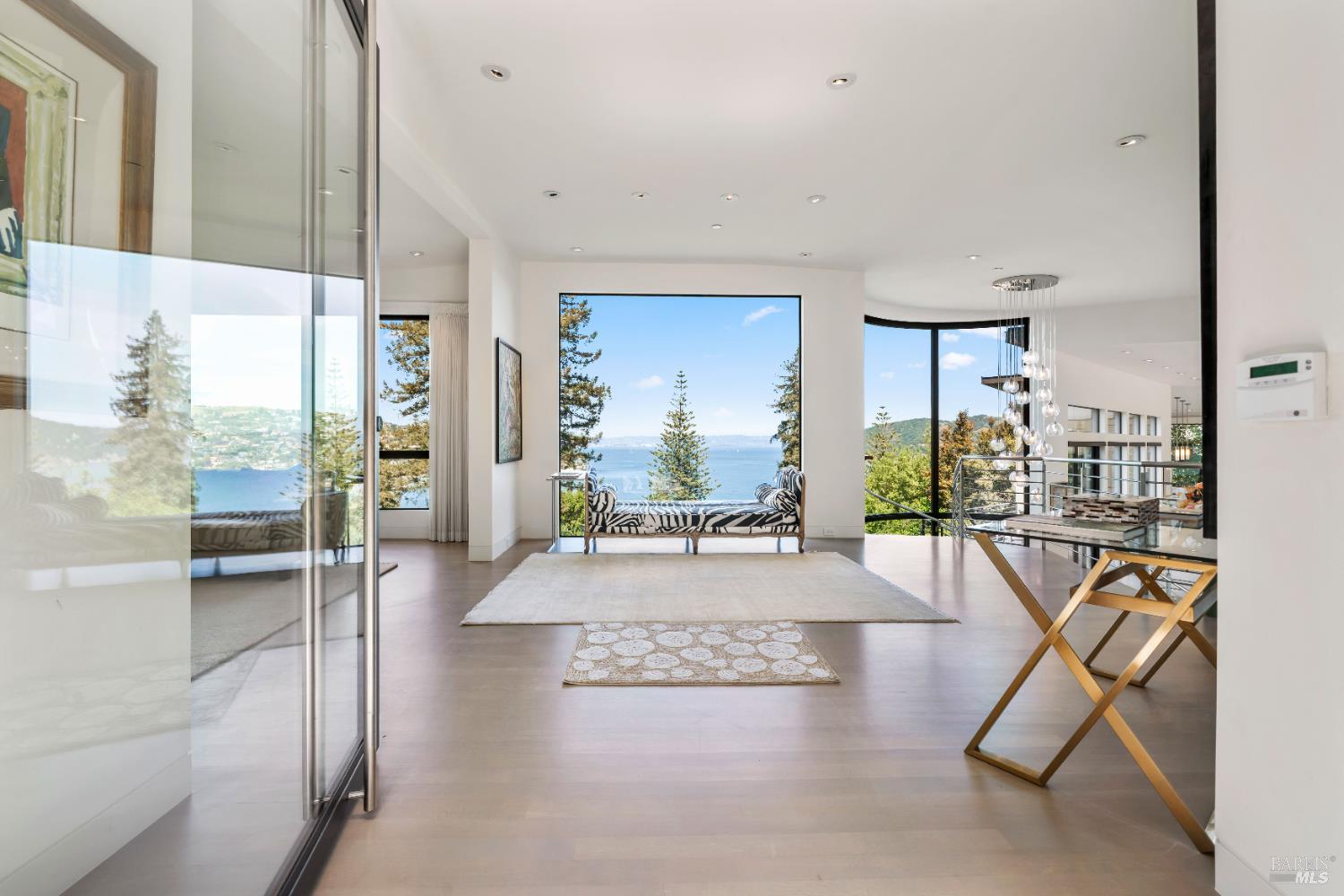 408 Golden Gate Avenue Belvedere, CA 94920 - Photo 8 of 71 a view of a living room and floor to ceiling window