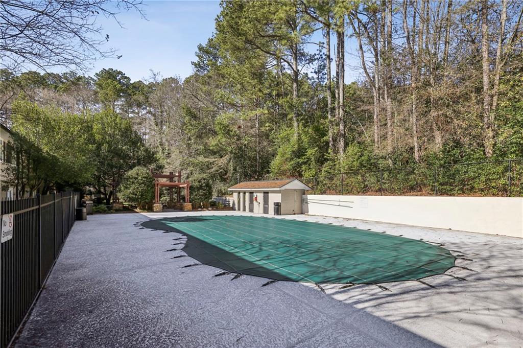 6940 Roswell Road, Unit A21 Atlanta, GA 30328 - Photo 24 of 25 a view of a backyard with green space