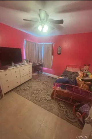 a room with furniture and a flat screen tv