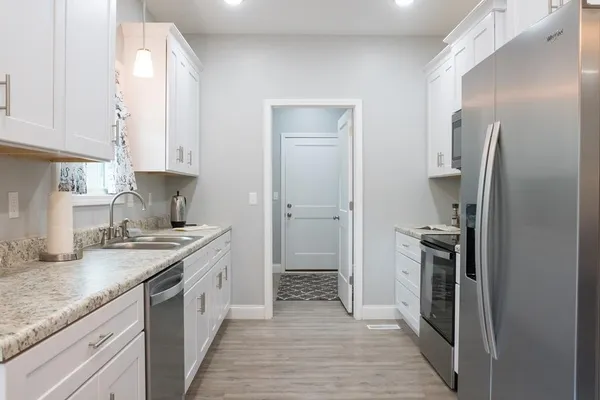 front view of a house and a yard