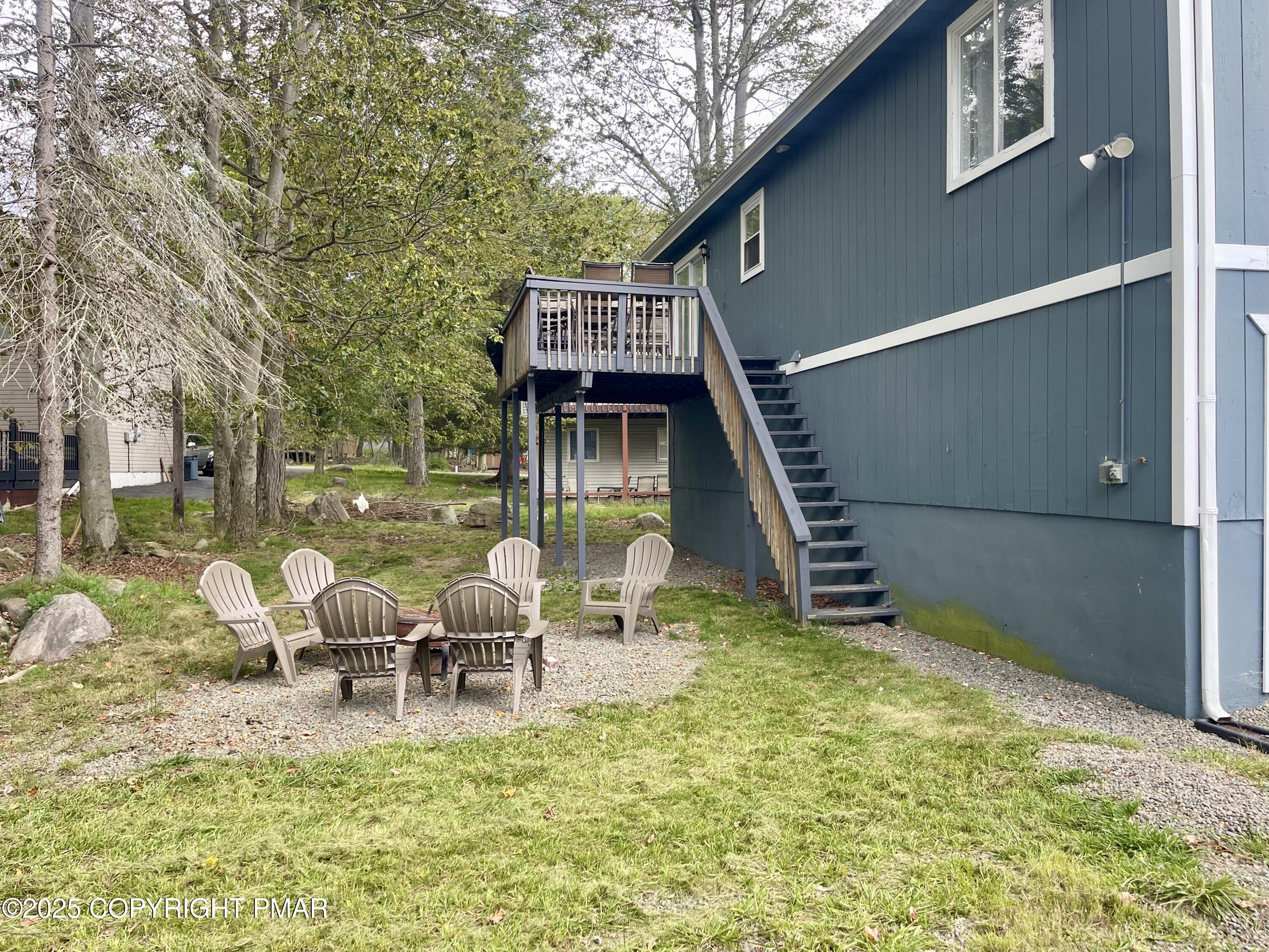 674 Country Pl Drive Tobyhanna, PA 18466 - Photo 16 of 17 a swimming pool with outdoor seating and yard